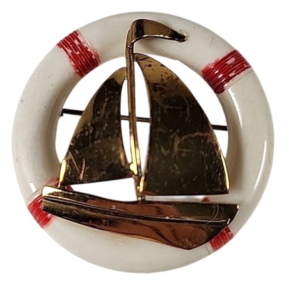 Circa 40's Or 50's Gold Tone Sailboat On Life Preserver Pendant